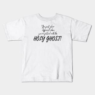 YOU JUST GLOW DIFFERENT WHEN YOU'RE FILLED WITH THE HOLY GHOST Kids T-Shirt